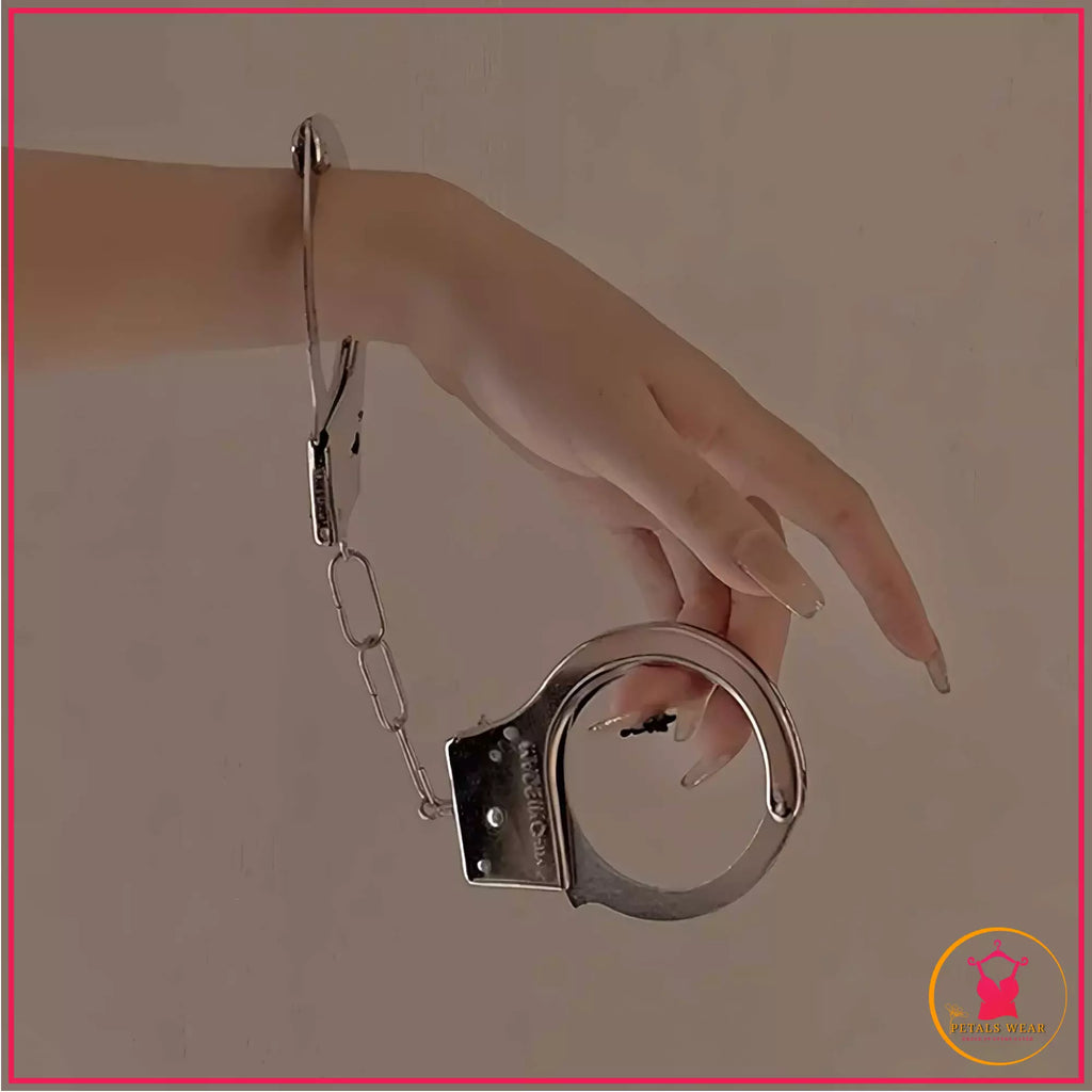 Adjustable metallic roleplay cuffs with matching keys
